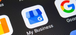 This image shows a phone displaying the Google my business app.